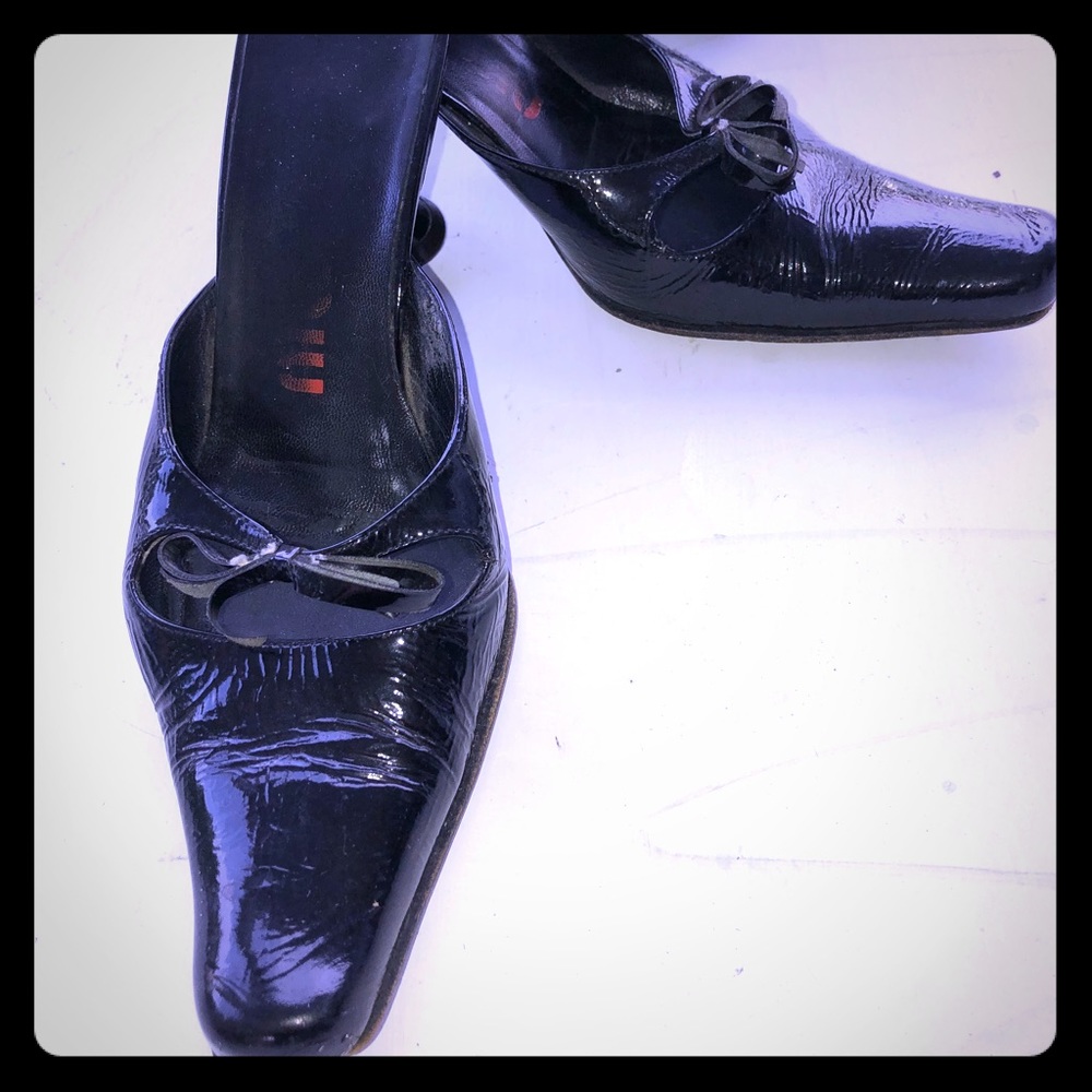 Miu miu patent mules.